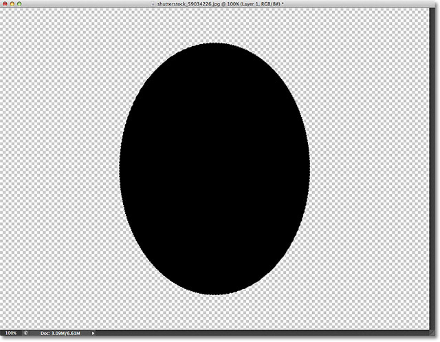 Pemilihan garis besar telah diisi dengan hitam. Image © 2012 Photoshop Essentials.com