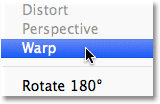 Choosing the Transform Warp command from the Edit menu in Photoshop. Image © 2012 Photoshop Essentials.com