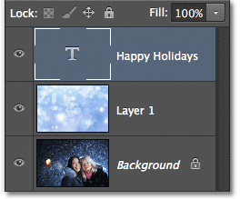 Панель Слои показывает добавленный текстовый слой. Image © 2012 Photoshop Essentials.com