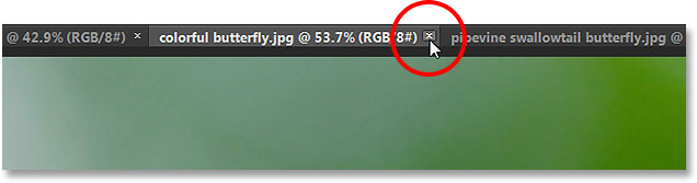 Closing a tabbed document in Photoshop CS6. Image © 2013 Photoshop Essentials.com