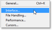 Choosing Photoshop's Interface preferences from the Edit menu. Image © 2013 Photoshop Essentials.com