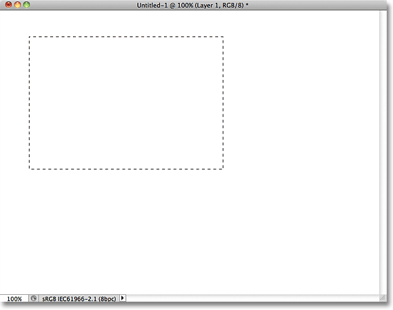 Drawing a rectangular selection on Layer 1. Image © 2011 Photoshop Essentials.com