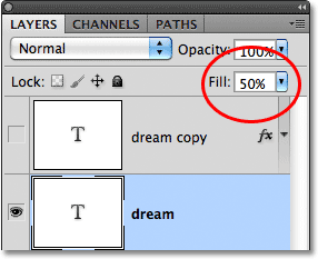 Lowering the Fill value of the layer to 50%. Image © 2011 Photoshop Essentials.com