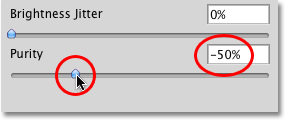 Lowering the Purity option for the brush to -50% in Photoshop. Image © 2010 Photoshop Essentials.com
