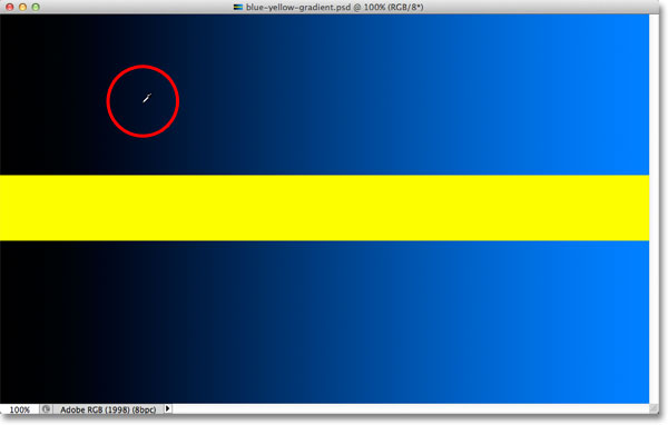 Clicking on a darker shade of blue in the gradient. Image © 2012 Photoshop Essentials.com