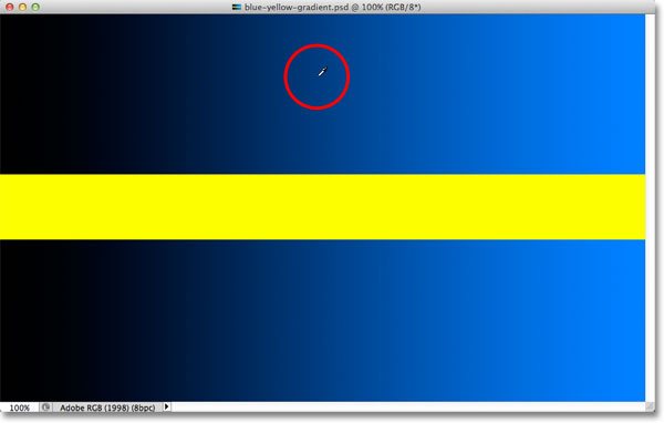 Clicking in the middle of the gradient with the Eyedropper Tool. Image © 2012 Photoshop Essentials.com