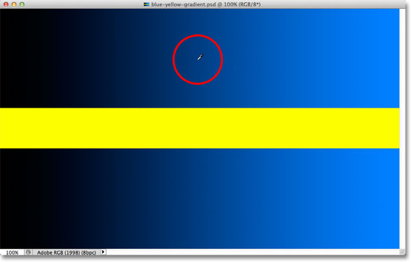 Clicking in the middle of the blue gradient. Image © 2012 Photoshop Essentials.com