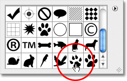 Selecting the Dog Print custom shape in Photoshop. Image © 2011 Photoshop Essentials.com