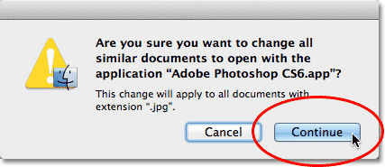 Clicking the Continue button. Image © 2013 Photoshop Essentials.com