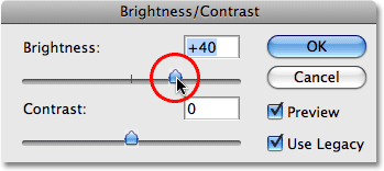 Перемещение ползунка яркости для повышения яркости изображения. Image © 2009 Photoshop Essentials.com