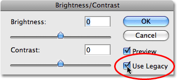 Опция 'Использовать прежние "в яркости диалоговое окно / Контрастность Photoshop. Image © 2009 Photoshop Essentials.com