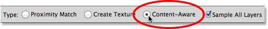 Memilih Content-Aware di Bar Pilihan. Image © 2013 Photoshop Essentials.com