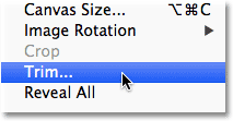 Selecting the Trim command from the Image menu. Image © 2012 Photoshop Essentials.com