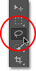 Selecting the Lasso Tool from the Tools panel in Photoshop CS6. Image © 2012 Photoshop Essentials.com