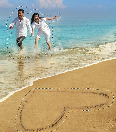 Adding the couple and the heart shape on the beach to the selection. Image © 2012 Photoshop Essentials.com