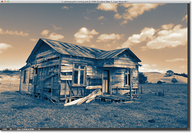 The photo with the Sepia-Cyan Photographic Toning preset applied. Image © 2012 Photoshop Essentials.com