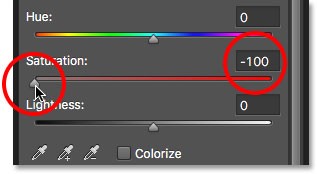Dragging the Saturation slider all the way to the left.