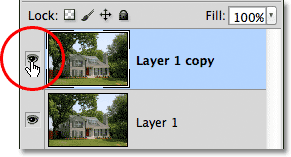 Clicking the layer visibility icon in the Layers panel. Image © 2012 Photoshop Essentials.com