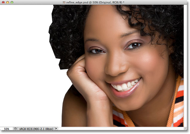 The document window showing the selection in front of a white background. Image © 2012 Photoshop Essentials.com