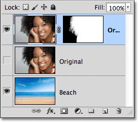 The Layers panel showing the layer mask on the new layer. Image © 2012 Photoshop Essentials.com