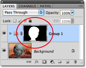 A layer mask has been added to the layer group. Image © 2010 Photoshop Essentials.com.