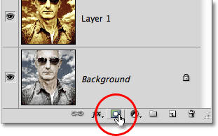 Clicking the Layer Mask icon in the Layers panel in Photoshop. Image © 2010 Photoshop Essentials.com.