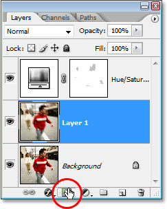 Clicking on the 'Layer Mask' icon at the bottom of the Layers palette.