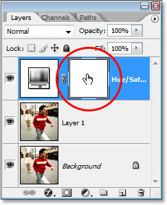 Clicking on the Hue/Saturation adjustment layer's layer mask thumbnail.