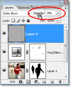 Lowering the opacity of the noise layer to 8%.