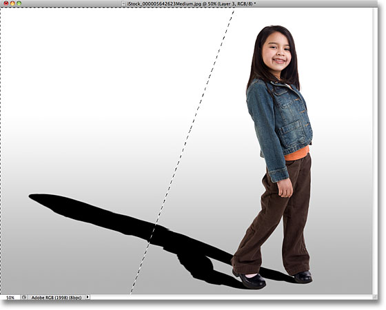 A selection outline appears in place of the Quick Mask overlay. Image © 2010 Photoshop Essentials.com.