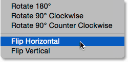 Choosing Flip Horizontal from under the Edit menu. Image © 2015 Photoshop Essentials.com.