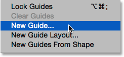 Choosing New Guide from under the View menu in Photoshop. Image © 2015 Photoshop Essentials.com.