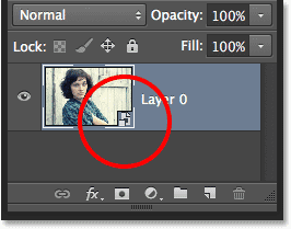 The layer preview thumbnail showing the Smart Object icon. Image © 2013 Photoshop Essentials.com