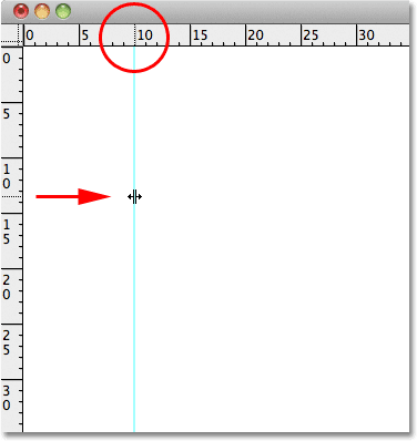 Placing a vertical guide in the Photoshop document. Image © 2011 Photoshop Essentials.com.