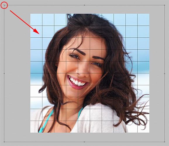 Resizing the photo with Free Transform in Photoshop. Image © 2011 Photoshop Essentials.com.