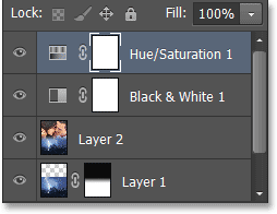 Panel Layers menampilkan Hue / Saturasi penyesuaian lapisan. Image © 2013 Photoshop Essentials.com