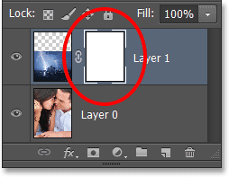 Sebuah layer mask thumbnail muncul pada Layer 1. Image © 2013 Photoshop Essentials.com