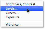 Choosing a Levels adjustment layer. Image © 2014 Photoshop Essentials.com.