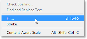 Selecting the Fill command from the Edit menu. Image © 2013 Photoshop Essentials.com