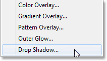 Выбор стиля слоя Drop Shadow. Image © 2013 Photoshop Essentials.com