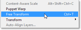 Memilih perintah Free Transform dari menu Edit. Image © 2013 Photoshop Essentials.com