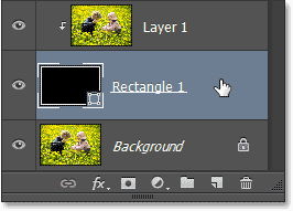 Memilih lapisan Shape dalam panel Layers. Image © 2013 Photoshop Essentials.com