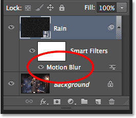 The Layers panel showing the Motion Blur Smart Filter. Image © 2013 Photoshop Essentials.com