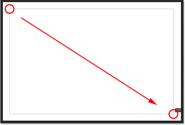 Dragging out a rectangular selection for the photo inside the border. Image © 2014 Photoshop Essentials.com.