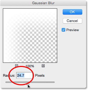 The Radius slider in the Gaussian Blur dialog box. Image © 2014 Photoshop Essentials.com.