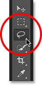 Memilih Lasso Tool di Photoshop. Image © 2013 Photoshop Essentials.com