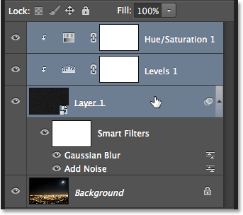 Memilih tiga lapisan sekaligus dalam panel Layers. Image © 2013 Photoshop Essentials.com