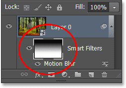 Smart Filter layer mask thumbnail yang menunjukkan gradien hitam ke putih. Image © 2013 Photoshop Essentials.com