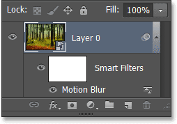 Panel Layers menampilkan Motion Blur Smart Filter. Image © 2013 Photoshop Essentials.com