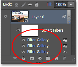 Три Smart Filters, перечисленные в панели Layers только как "Фильтр галерее. Image © 2013 Photoshop Essentials.com